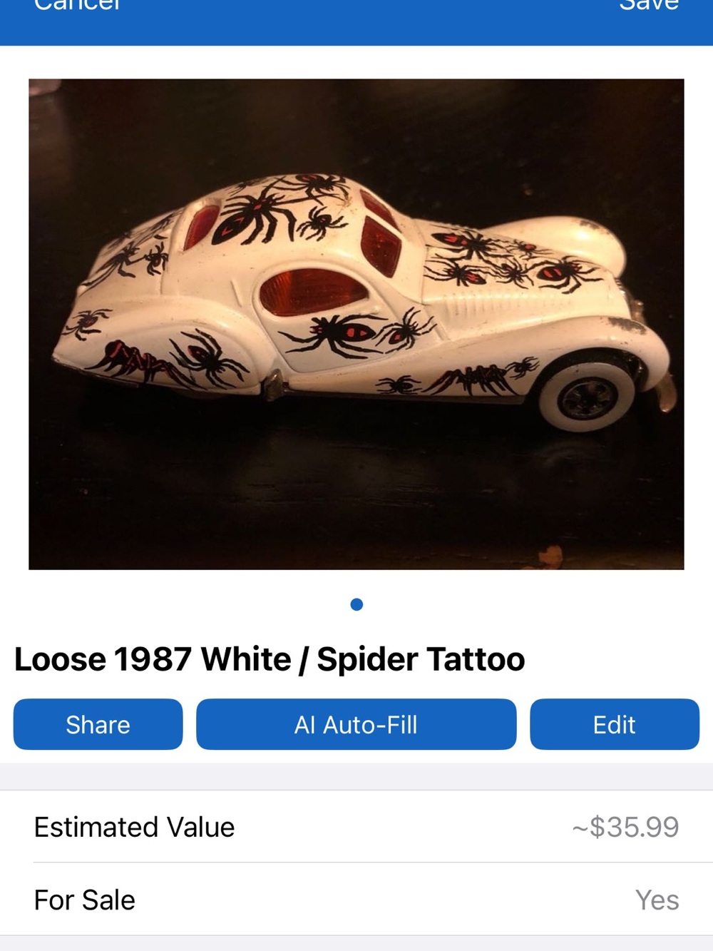 White Die-Cast Coupe with Black & Red Spider Decals